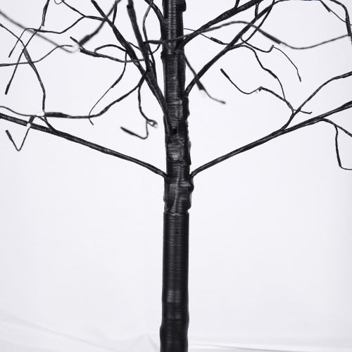 Black tree branch against a white background