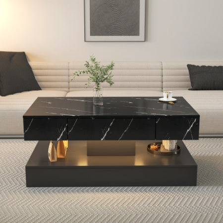 Modern living room with a black marble coffee table and beige sofa.