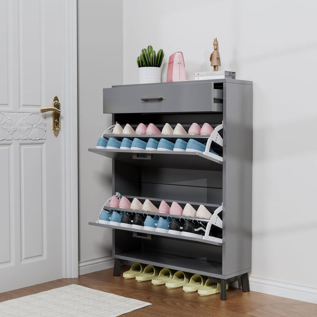 Gray shoe cabinet with multiple shelves filled with colorful shoes next to a white door.