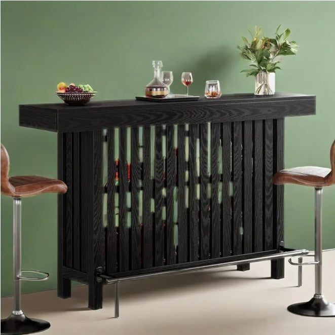 Black slatted wood bar console, 62.99 inches wide and 41.53 inches tall, with lower shelf and footrest rail