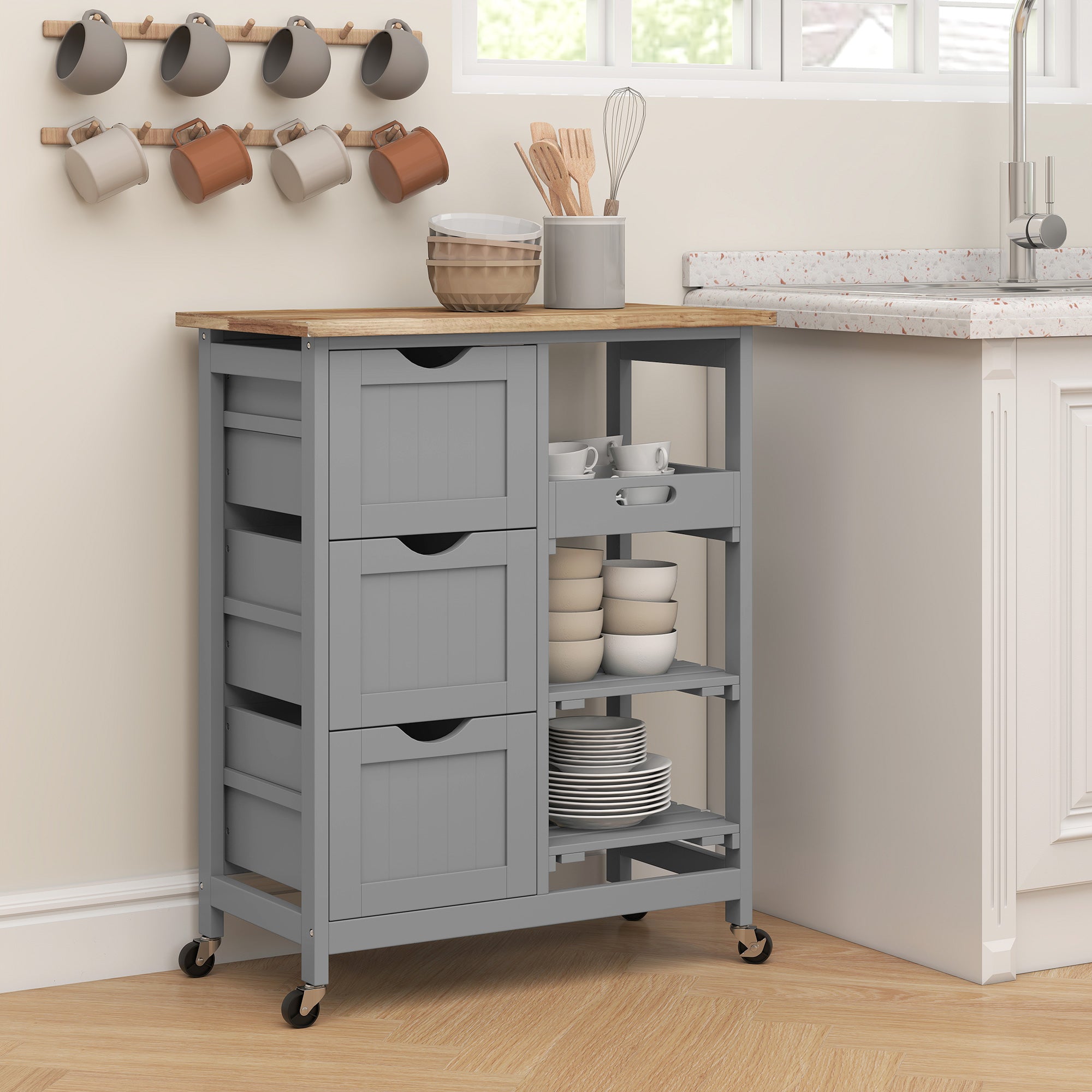 Gray kitchen cart with wooden top in a kitchen setting