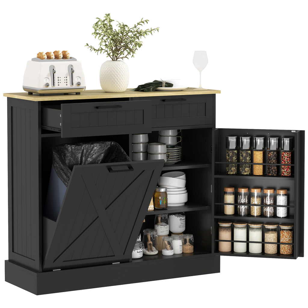 Black kitchen cabinet with open door displaying jars and a countertop with kitchen items.