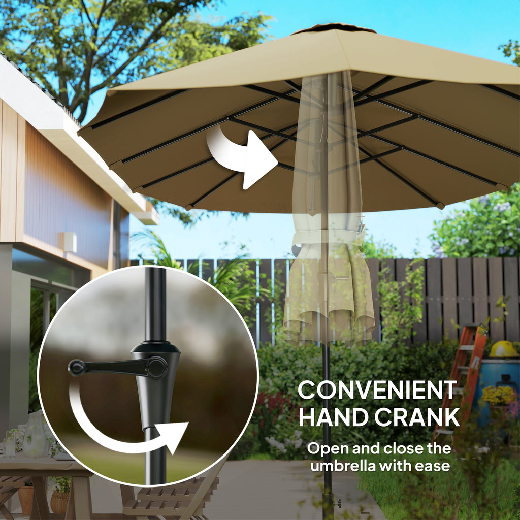 Beige patio umbrella with hand crank mechanism in a garden setting