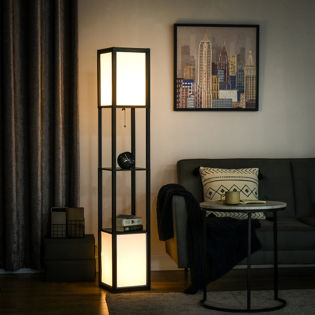 Living room with a floor lamp, sofa, and wall art