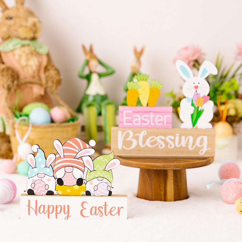 Easter-themed decorations including a cake stand with 'Easter Blessing' and Easter gnomes on a white surface.