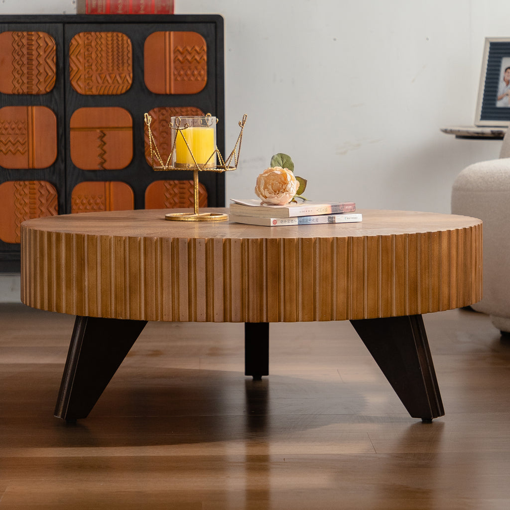Wooden coffee table with decorative items in a living room setting