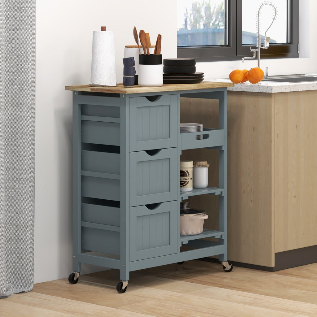 Kitchen island cart with storage shelves and drawers in a kitchen setting.