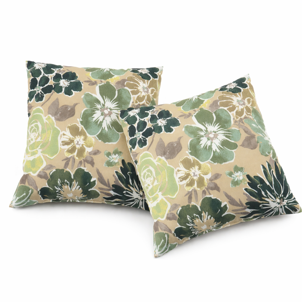 Two floral-patterned pillows on a white background
