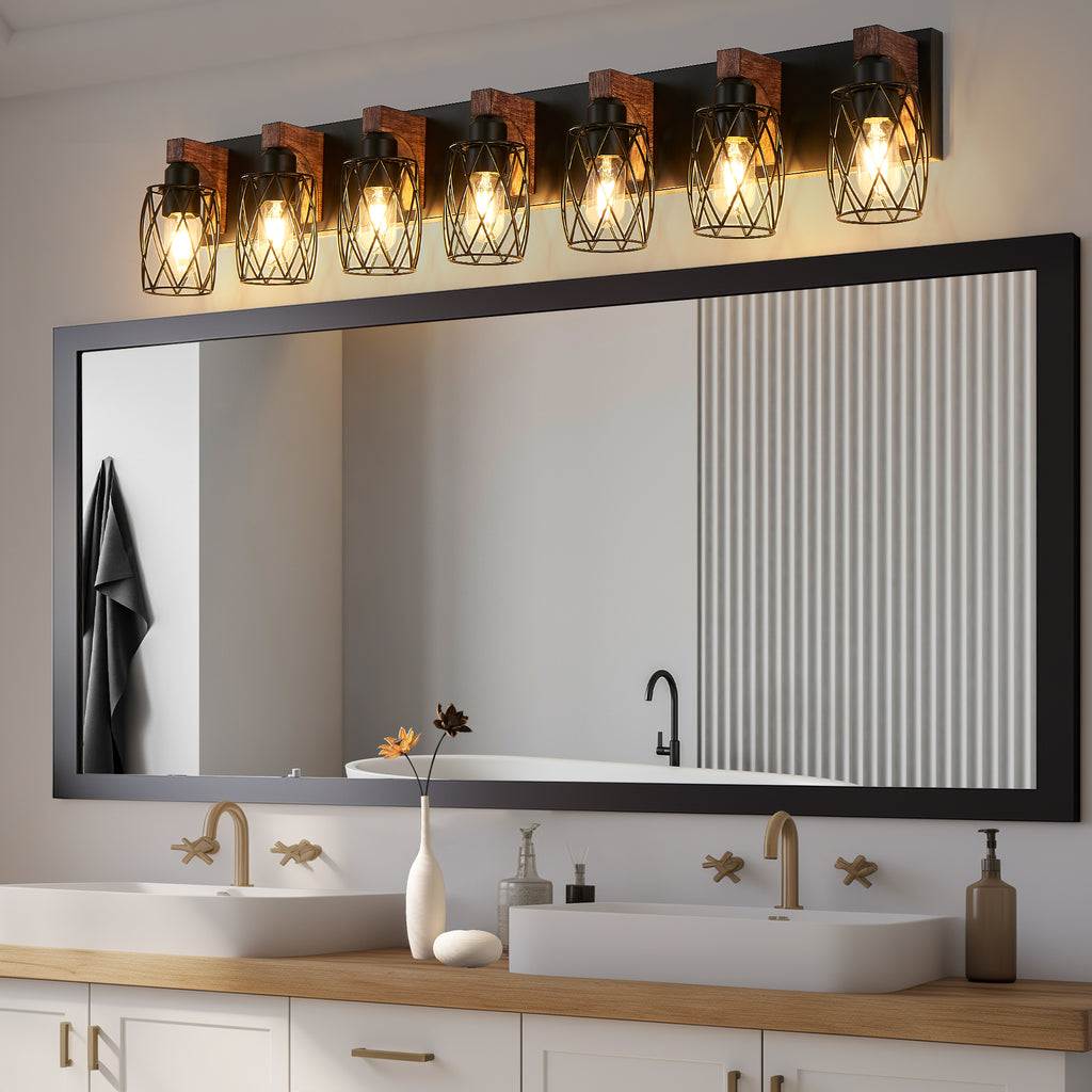 Bathroom vanity with mirror, lights, and sink.