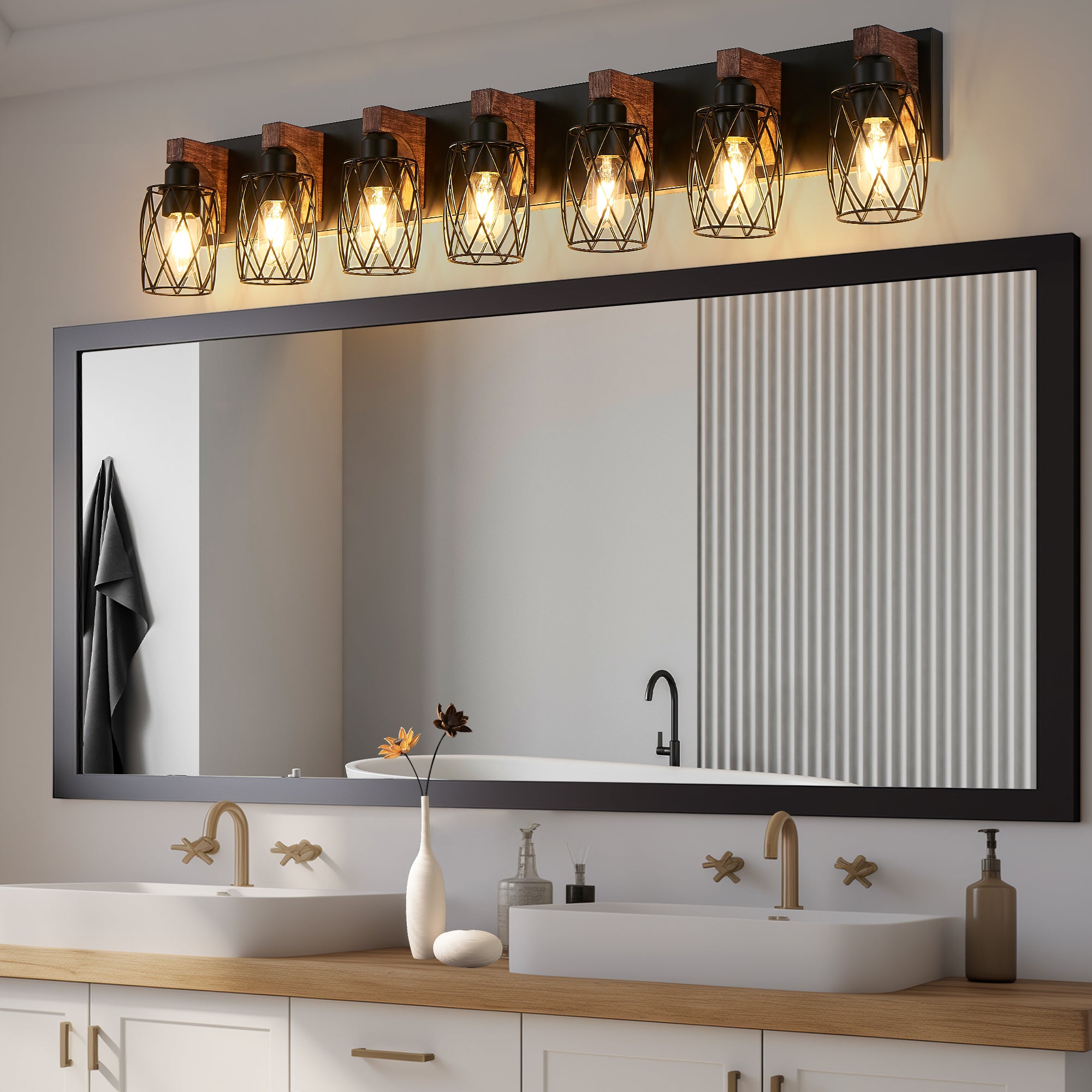 Bathroom vanity with mirror, lights, and sink.