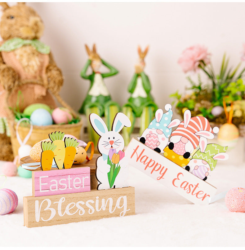 Decorative Easter items including a rabbit, carrots, and 'Happy Easter' sign on a white background.
