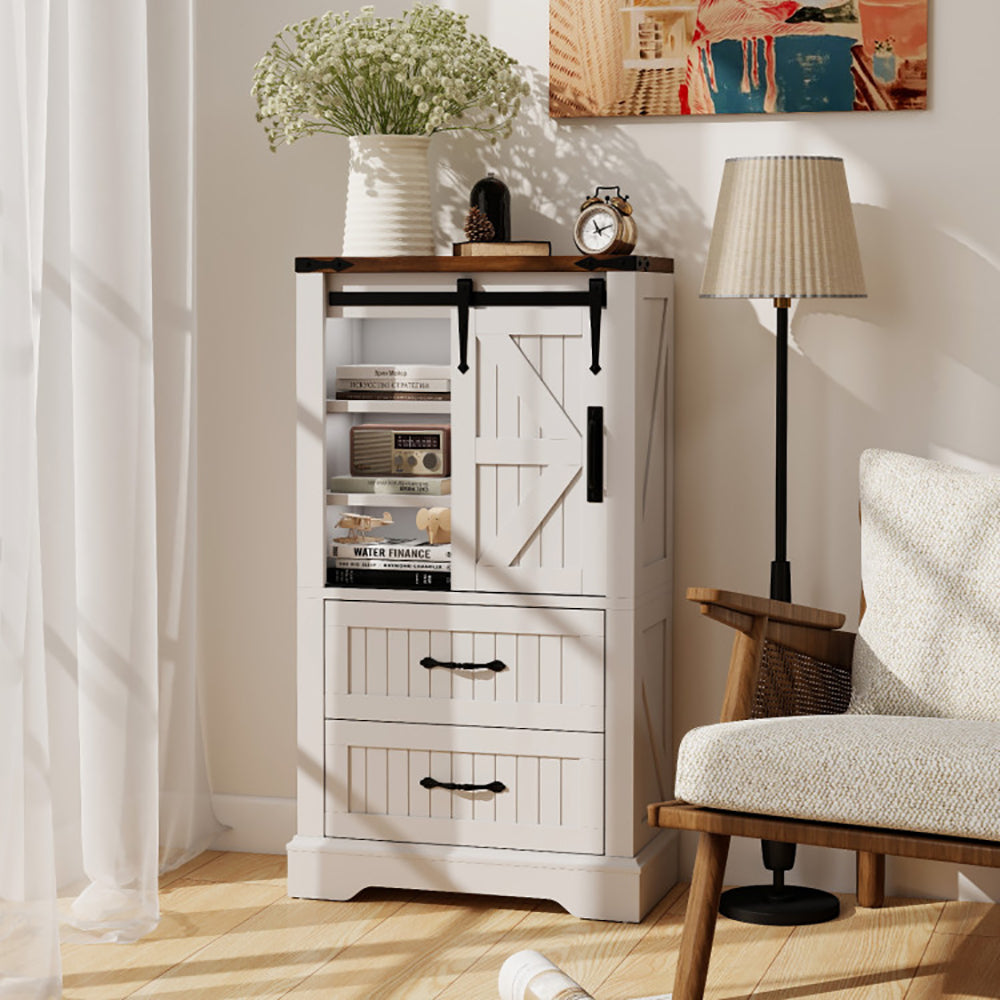 White storage cabinet with sliding door in a room with a chair and lamp.