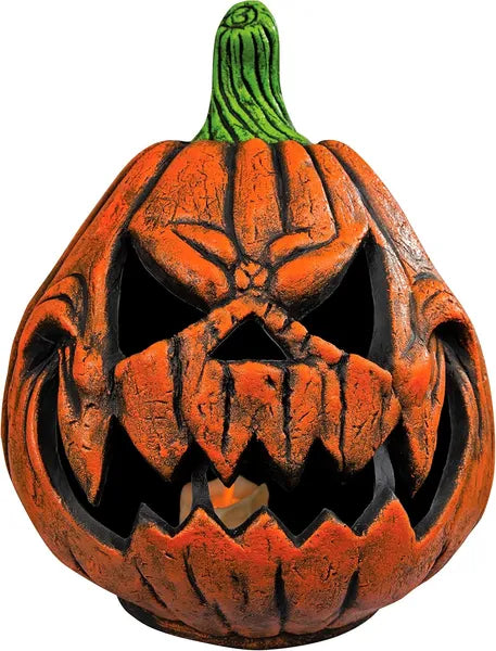 Decorative jack-o'-lantern with a carved face on a white background