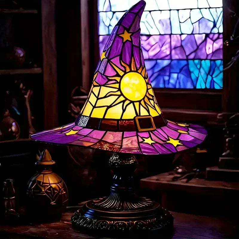 Stained glass witch hat lamp with a QR code on a dark background