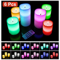 Set of six colorful LED candles with a remote control on a black background.