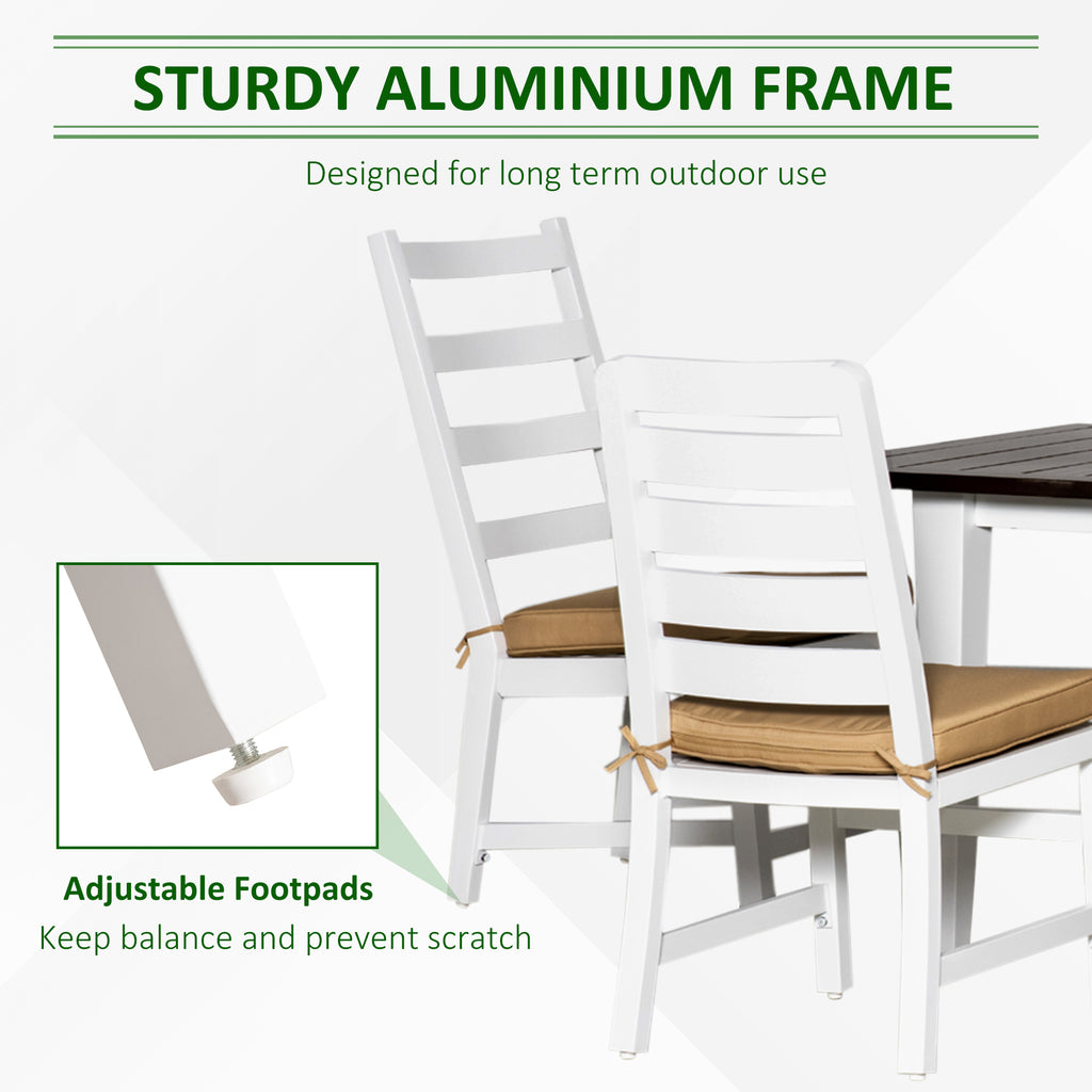 White chairs with brown cushions on a table, featuring a sturdy aluminium frame and adjustable footpads.