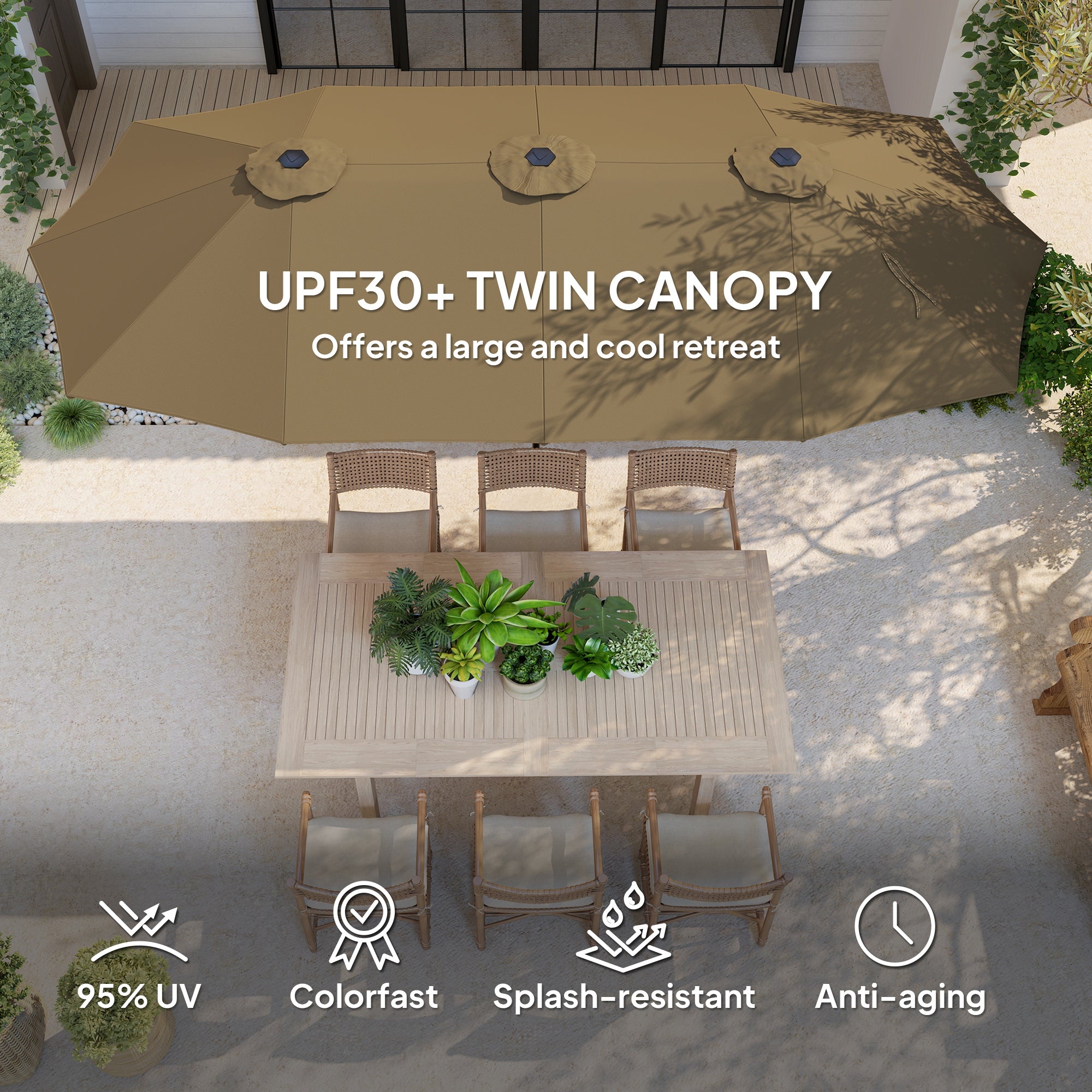 Large outdoor umbrella with twin canopy providing shade over a dining area.