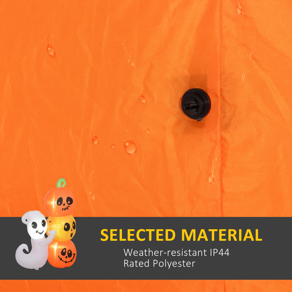 Orange fabric with a button and Halloween-themed decorations on a black banner.