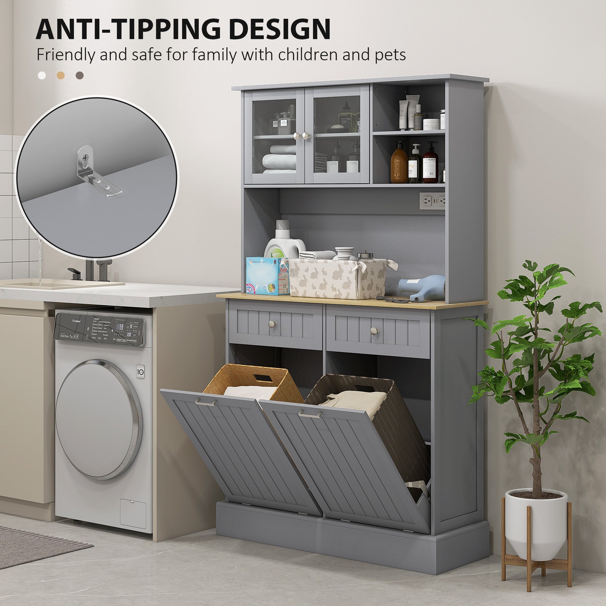 Gray kitchen cabinet with anti-tipping design feature, washing machine on left, plant on right.