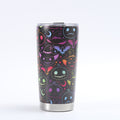 Tumbler with Halloween-themed design on a white background