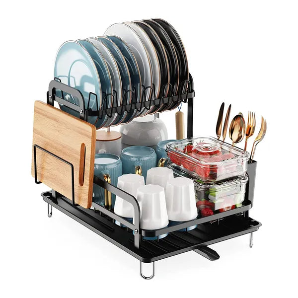 Dish drying rack with plates, cups, and utensils on a white background