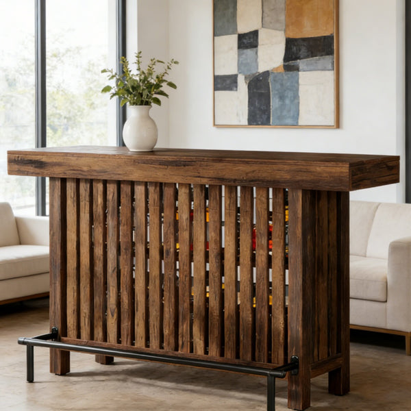 Walnut slatted wood bar table with metal footrest rail and lower storage shelf styled in a modern living room