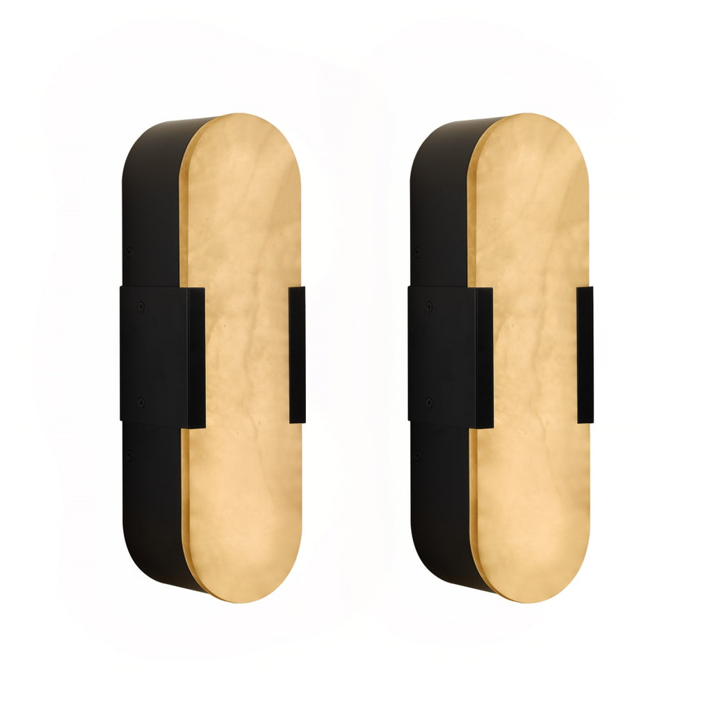 Two gold and black wall sconces on a white background