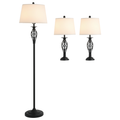 Set of three lamps with black metal stands and white lampshades on a white background
