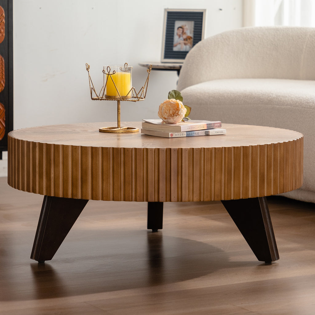 Wooden coffee table with decorative items in a living room setting